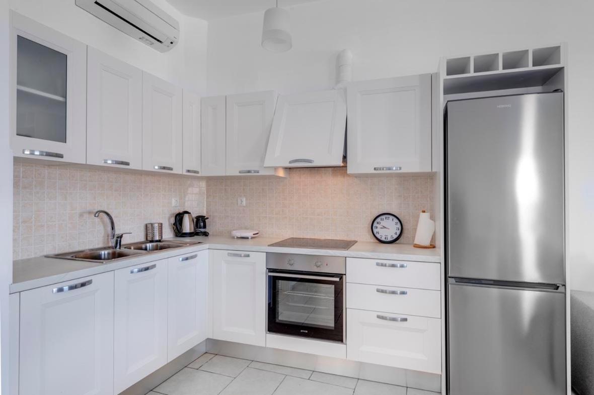 Waterview Apartments Kini Extérieur photo